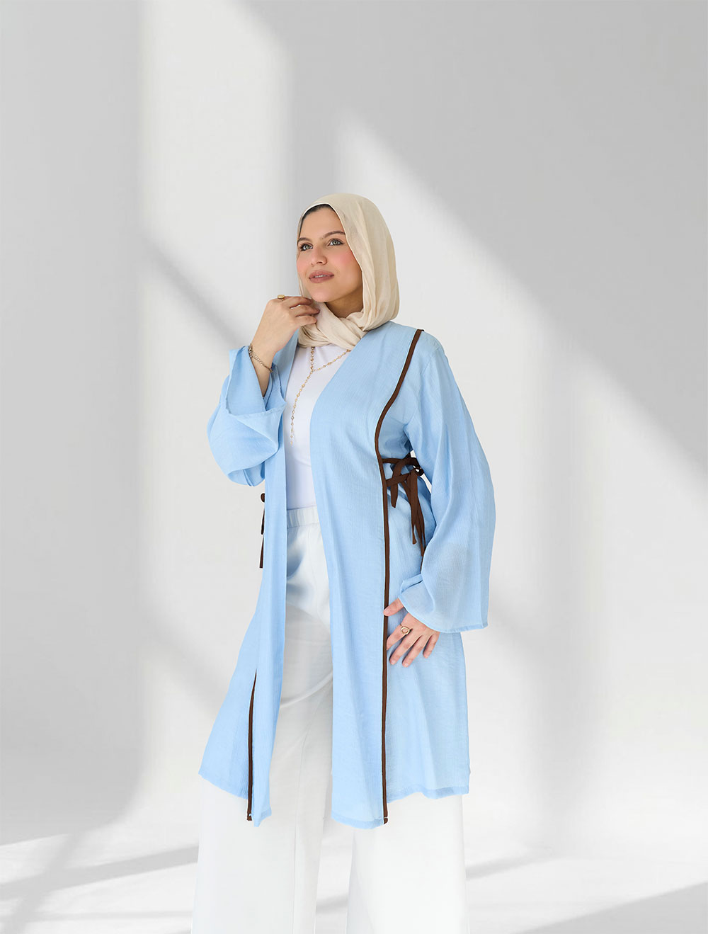 Blue Galaxy Linen Cardigan, a sky-blue open cardigan with a tie waist