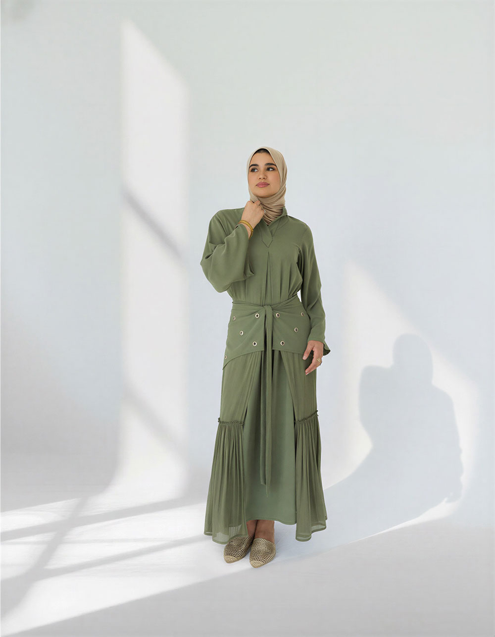 Olive Mada Dress, a belted shirt-dress with eyelet trim and tiered hem