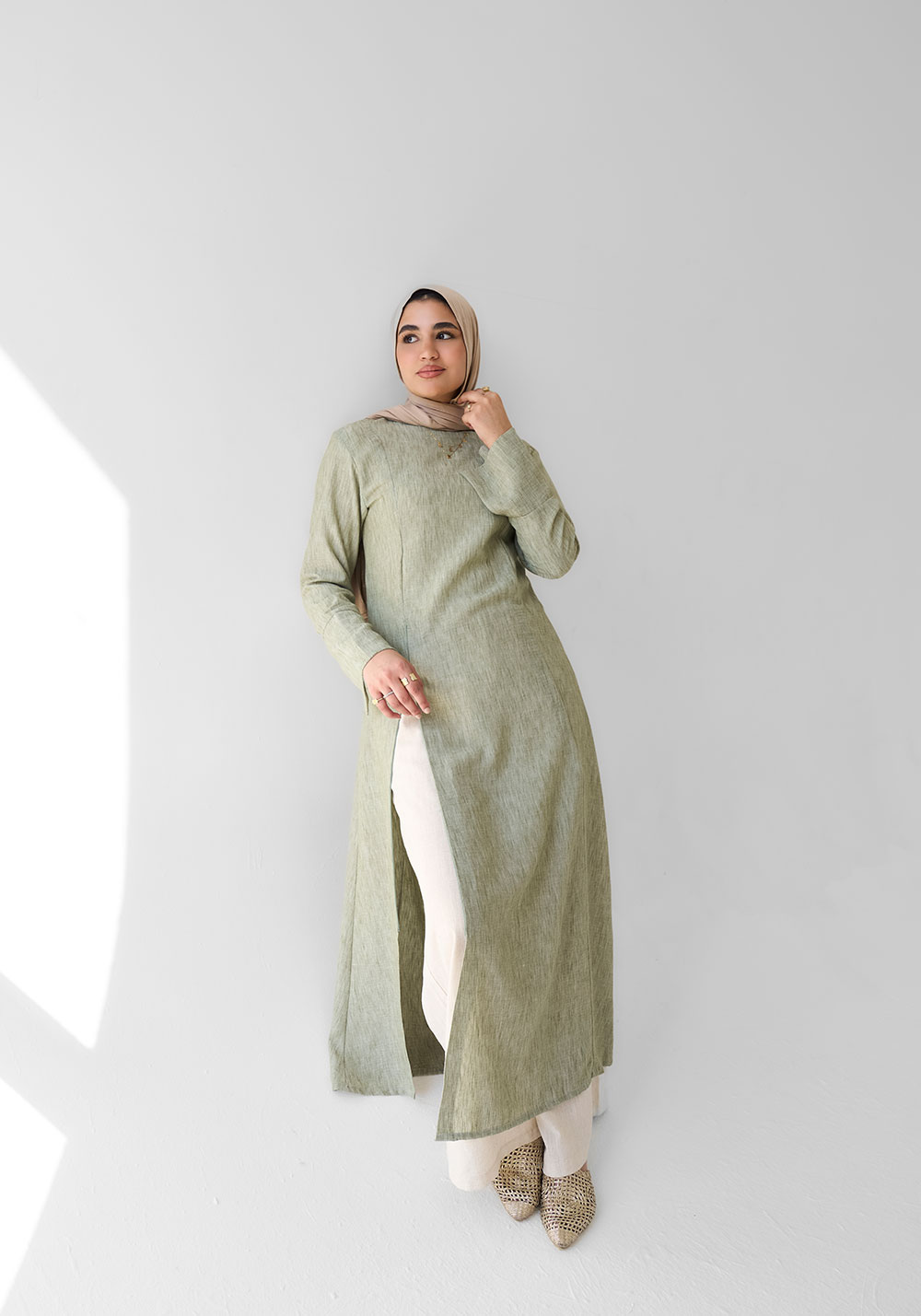 Mint Modern Tunic Dress worn with wide-leg trousers
